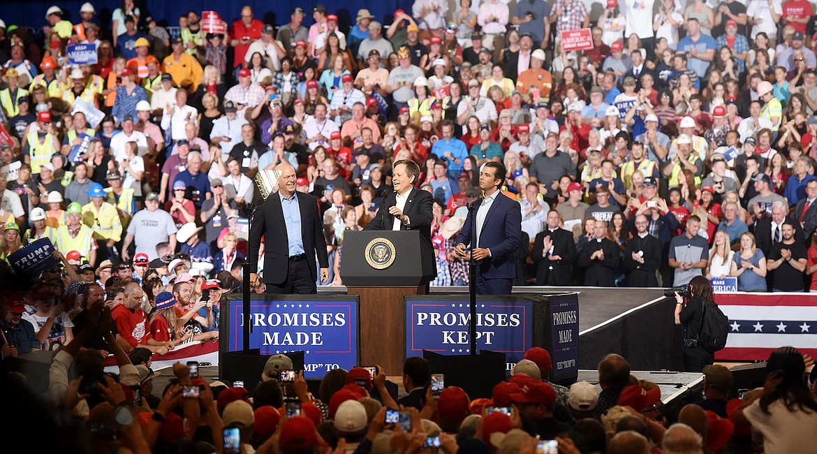 From left, Representative Greg Gianforte, Senator Steve Daines and Donald Trump, Jr., warm up the crowd of thousands before President Donald J. Trump took the stage on Thursday afternoon, July 5, in Great Falls.(Brenda Ahearn/Daily Inter Lake)