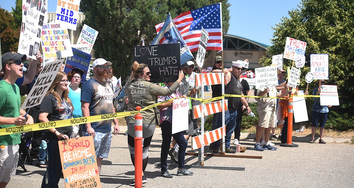 About 40 protestors gathered early in the afternoon and were relegated to a &#147;free speech&#148; area. By about 4 p.m. their numbers had swelled to close to 300.(Brenda Ahearn/Daily Inter Lake)