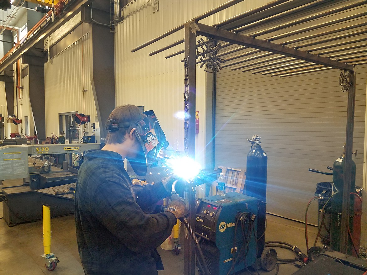 Members of the North Idaho College welding program recently built two fire hose racks for Kootenai Fire and Rescue. NIC student Ryan Moseley, from Oldtown, is pictured welding one of the racks. Used for drying and storing hoses, the racks cost Kootenai Fire and Rescue only material costs, which saved about $1,200 per rack. The racks were built by first- and second-year students. NIC&#146;s Welding program regularly builds projects for organizations in the community such as Coeur d&#146;Alene Police and the Post Falls Food Bank.

(Photo courtesy NORTH IDAHO COLLEGE)