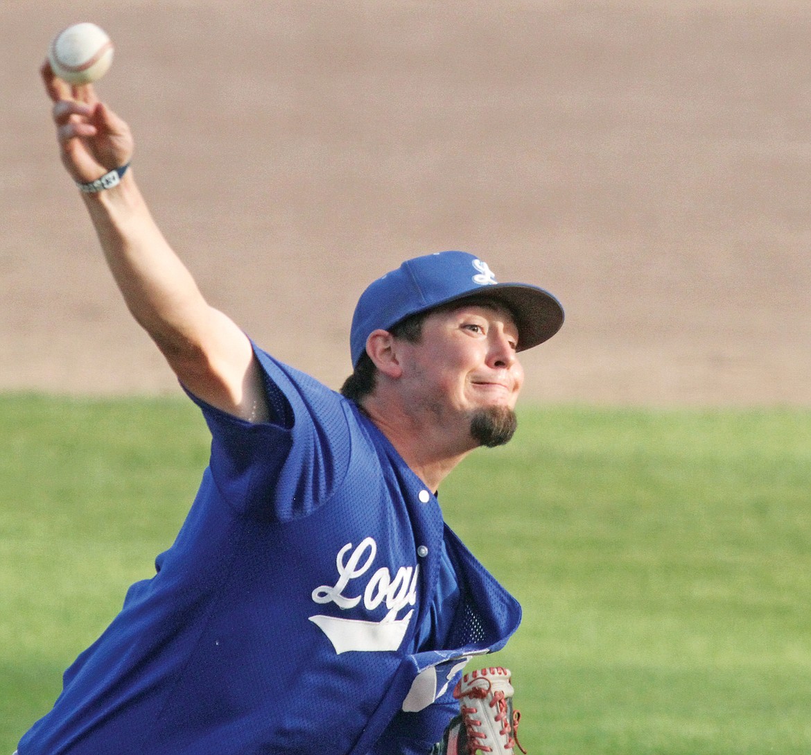Joe Flores delivers the 0-2 pitch for a strike and the second out top of sixth inning vs. Strathmore Saturday. Loggers win first of a doubleheader 15-2. (Paul Sievers/The Western News)