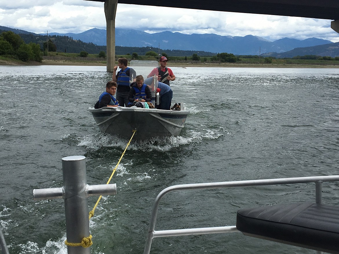 Courtesy photo
The Boundary County Sheriff&#146;s boat tows a boat to safety that had lost power and was adrift in a strong current last weekend.