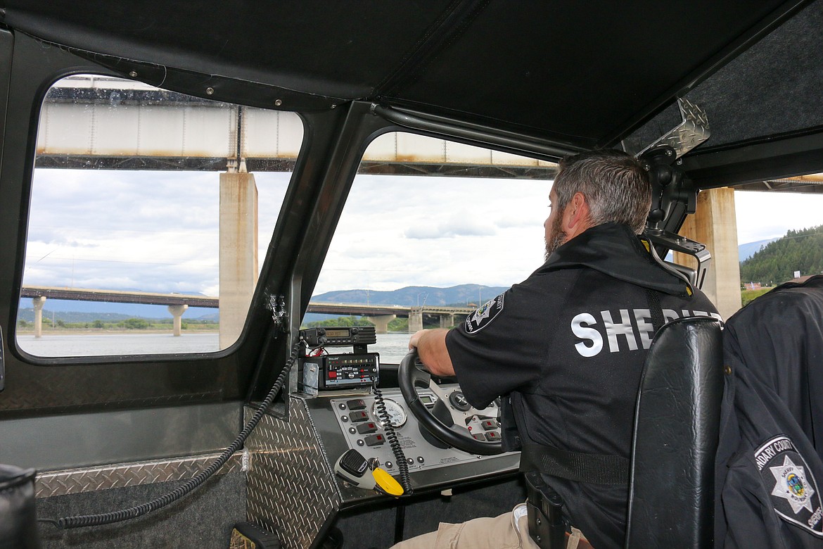 Photo by MANDI BATEMAN
Boundary County Sheriff&#146;s Reserve Deputy Scott Brown learning the channels of deeper water on the Kootenai River.