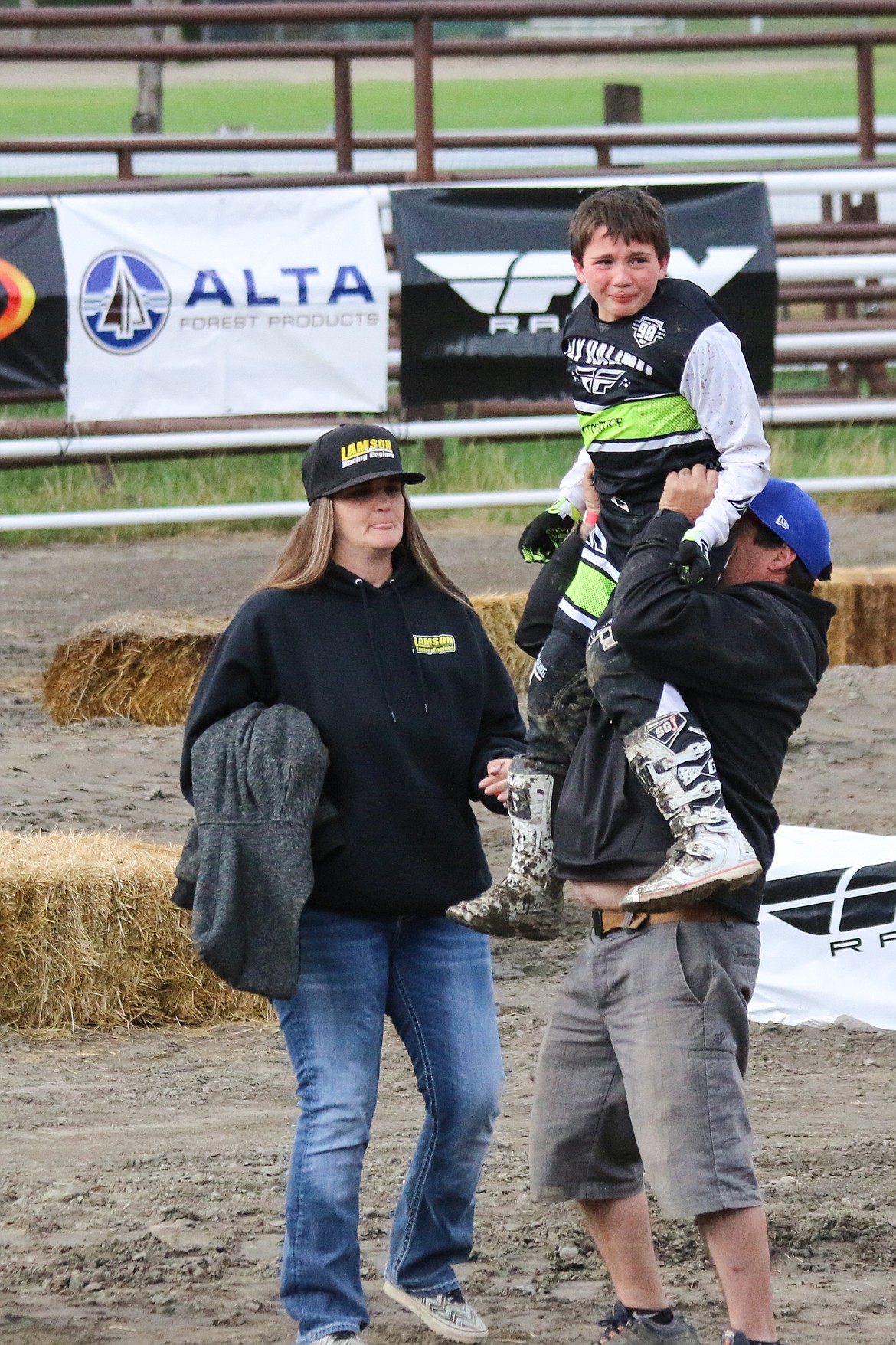 Photo by MANDI BATEMAN
Accidents happen, but mom and dad were close by to make sure their son was alright after a minor spill.