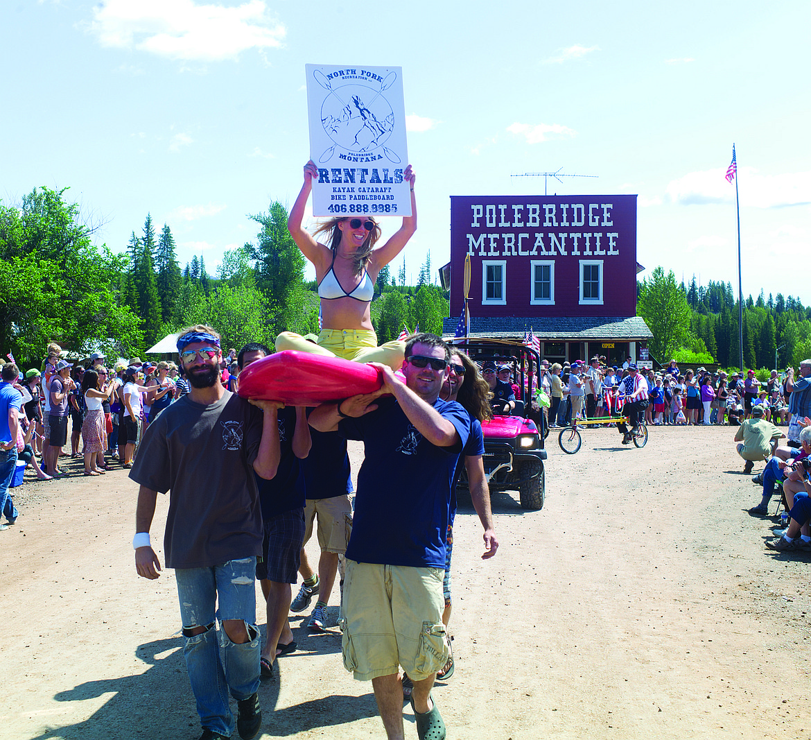 Emma Simonson rides adopt the North Fork rentals float.