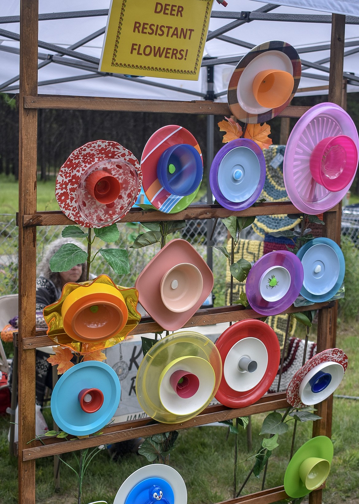 Pat Shirk&#146;s &#147;deer resistant flowers&#148; on display at the sixth annual Yaak School Arts and Crafts Fair Saturday, June 30. The flowers were sold in addition to her woven items, and Shirk said she enjoys coming to the Yaak for the community and to support the school. 
(Ben Kibbey/The Western News)