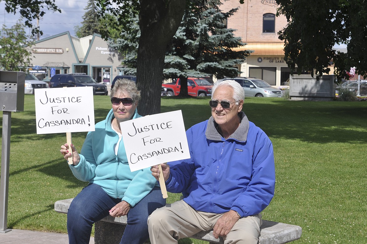 PAM AND GARY DeNevi of Polson sit outside the Lake County Courthouse during a protest following the decision to release suspects believed to be involved with the death of Cassandra Harris. (Ashley Fox/Lake County Leader)