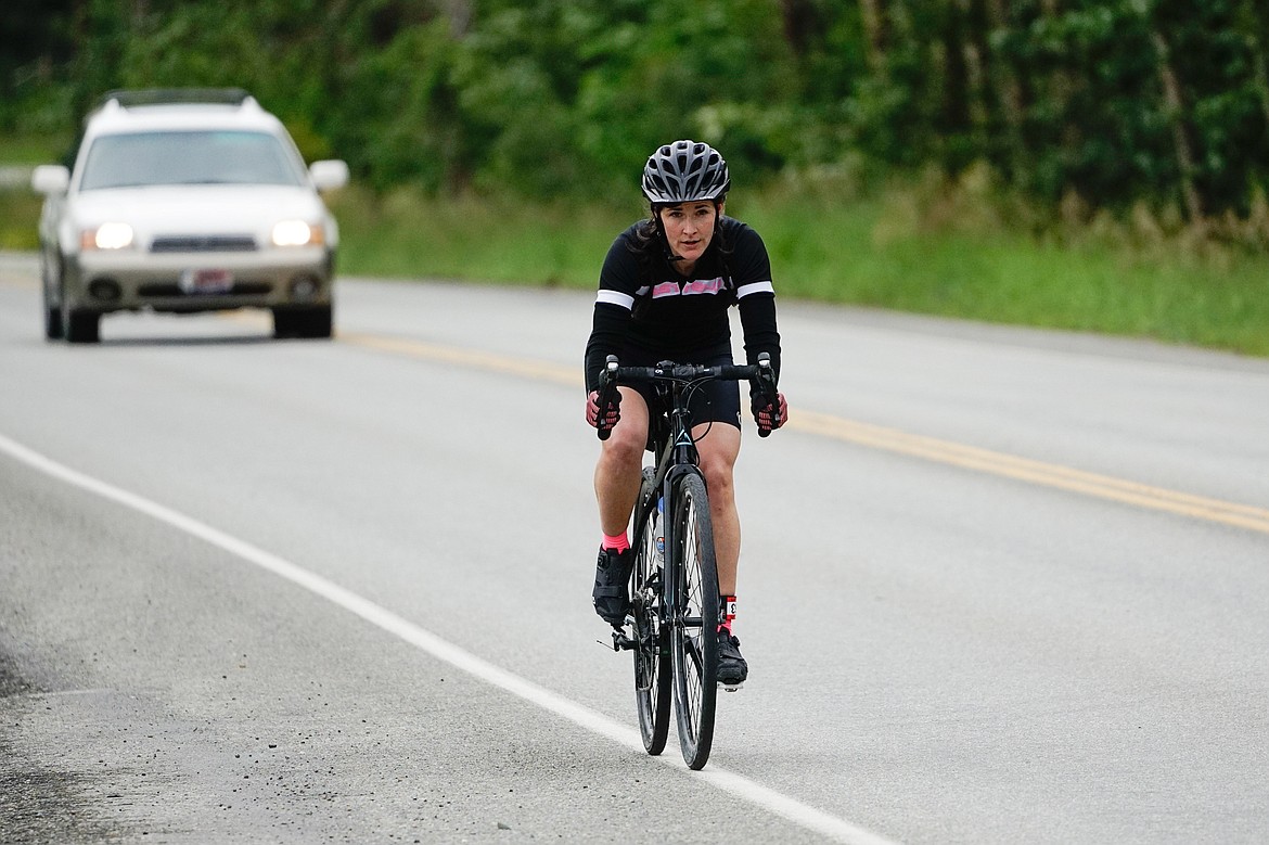 A cyclist races down East Lakeshore Drive during the Glacier Challenge on Saturday.