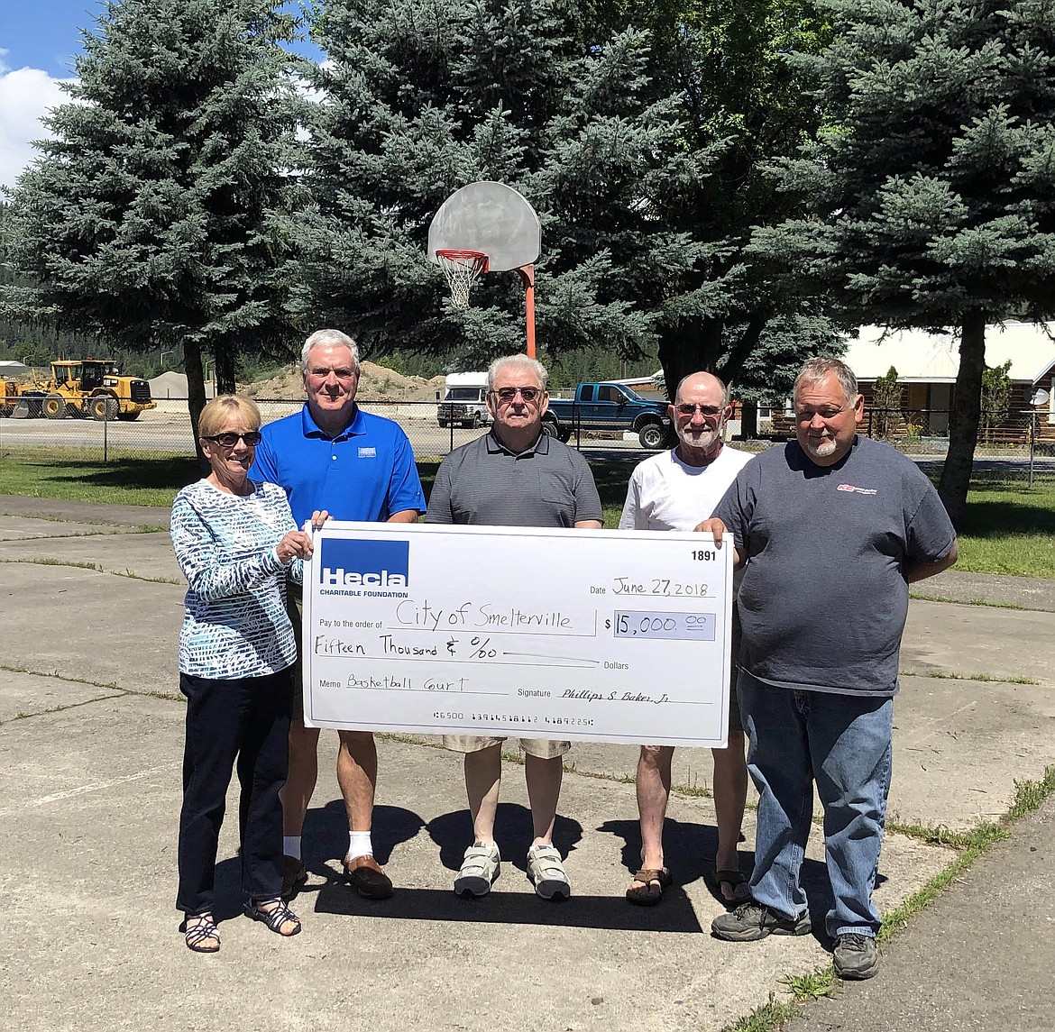 Members of the Smelterville City Council are pictured alongside Dexter inside Smelterville City Park. Pictured are Linda Guthmiller, Dexter, Charles Atha, Dennis Fretheim and Smelterville mayor Tom Benson.