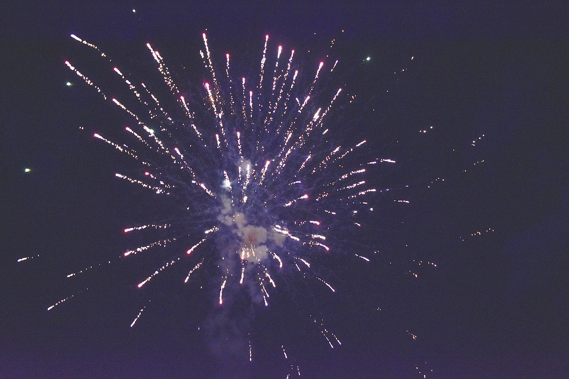 Joe Wade&#146;s fireworks explode in the sky over the Yaak River Tavern and Mercantile during the Yaak&#146;s annual Fourth of July fireworks display on Saturday, June 30. (Ben Kibbey/The Western News)