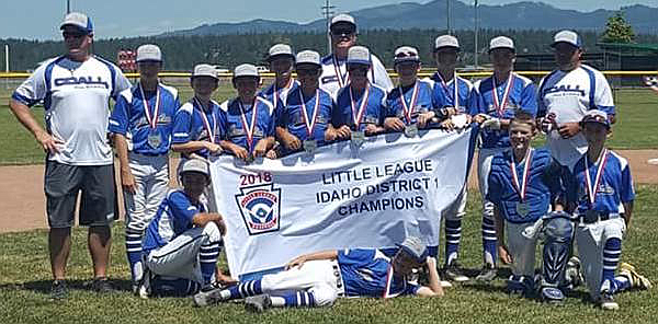 Courtesy photo
The Coeur d'Alene 12U (Majors) all-star team celebrates after winning the Little League District 1 baseball championship last weekend in Hayden. In the front row from left are Jake Dannenberg, Kyle Seman, Avrey Cherry and Karl Schwarzer; and back row from left, manager Sean Cherry, AJ Currie, Chase Saunders, Caden Symons, Cooper smith, Cooper Erickson, Chris Reynolds, Nolan Christ, Braeden Newby and coach Manny Azevedo; and rear, coach Steve Saunders. Coeur d'Alene will play West Valley of Eagle/Star/Middleton in the best-of-3 state championship series at Duck Alley in Eagle. Game 1 is tonight at 5:30 p.m. PDT, Game 2 is Saturday at 10 a.m. and Game 3, if necessary, is Sunday at 10 a.m. The winner advances to the Little League Northwest Regional in San Bernardino, Calif. Coeur d'Alene and West Valley have met each of the last two years in the state playoffs, with each team winning once.