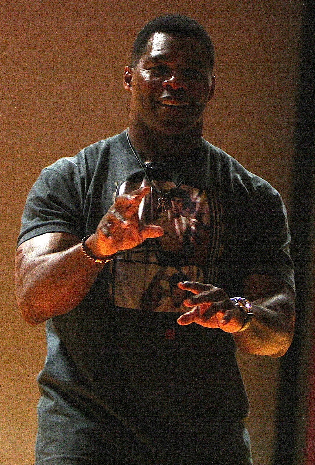 Former NFL player and Heisman Trophy winner Herschel Walker spoke to Fairchild Air Force Base personnel on Wednesday about his multiple personality disorder and other challenges he has faced. (BRIAN WALKER/Press)