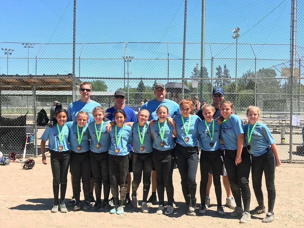 Courtesy photo
The North Idaho Bombers 12-and-under softball team won the championship in the Silver Bracket at the Fourth Of July shootout in Spokane. In the front row from left are Samarah Chavez, Taylor Hill, Payton Sterling, Madison Mitchell, Sophia Zufelt, Kamryn Pickford, Gia Janke, Katie Berg, Kamryn Curry and Kayla Rouse; and back row from left, coaches Kevin Pickford, Terry Zufelt, Jared Janke and Tom Curry.