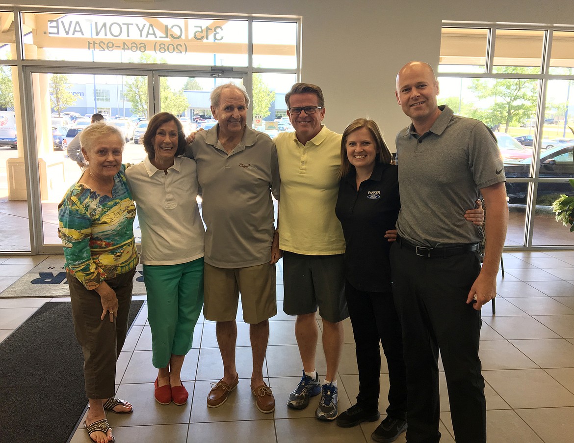 It was something of an informal family reunion last week when previous owners of the Ford dealership dropped in on the new owner of Mike White Ford of Coeur d&#146;Alene. From left: Madge Myklebust, customer relations; Lynn and Tom Addis, former owners; Mike White, owner, and daughter Chelsea, assistant service manager; and Kirk Lauer, fleet manager. (Courtesy Photo)