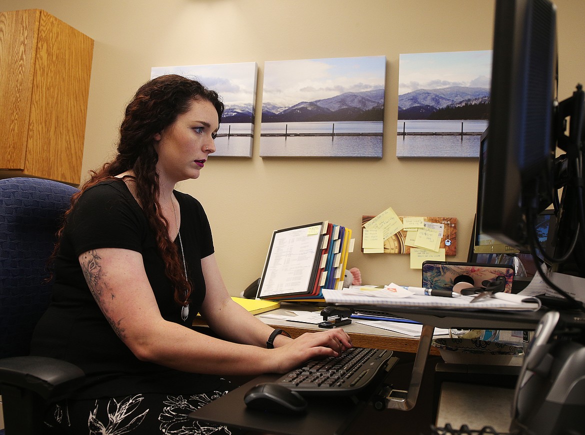 City of Hayden administration assistant Kalyn Menzies organizes files Friday afternoon at Hayden City Hall. (LOREN BENOIT/Press)