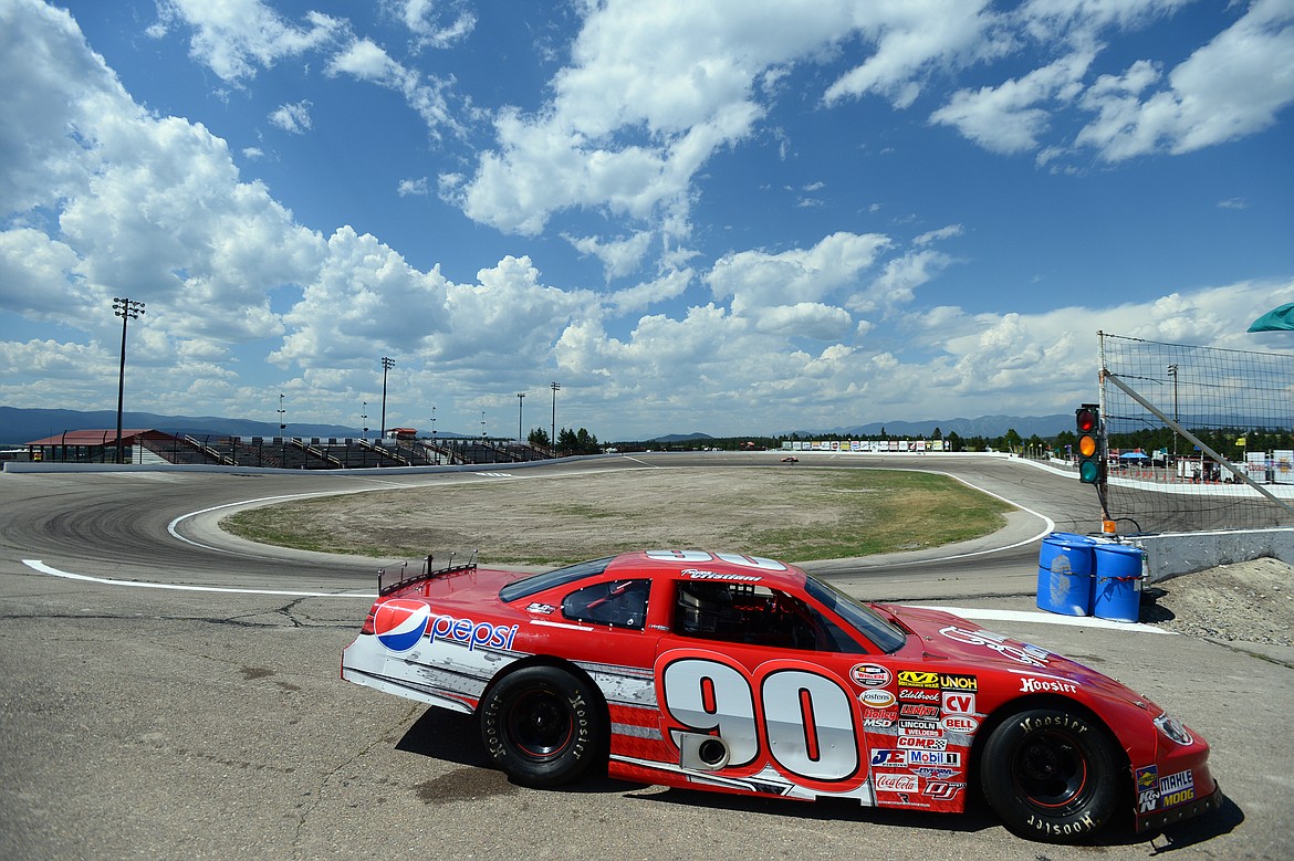 Trevor Cristiani heads back to the pit area after running a few hot laps at Montana Raceway Park on Thursday in preparation for Saturday's Montana 200. (Casey Kreider/Daily Inter Lake)