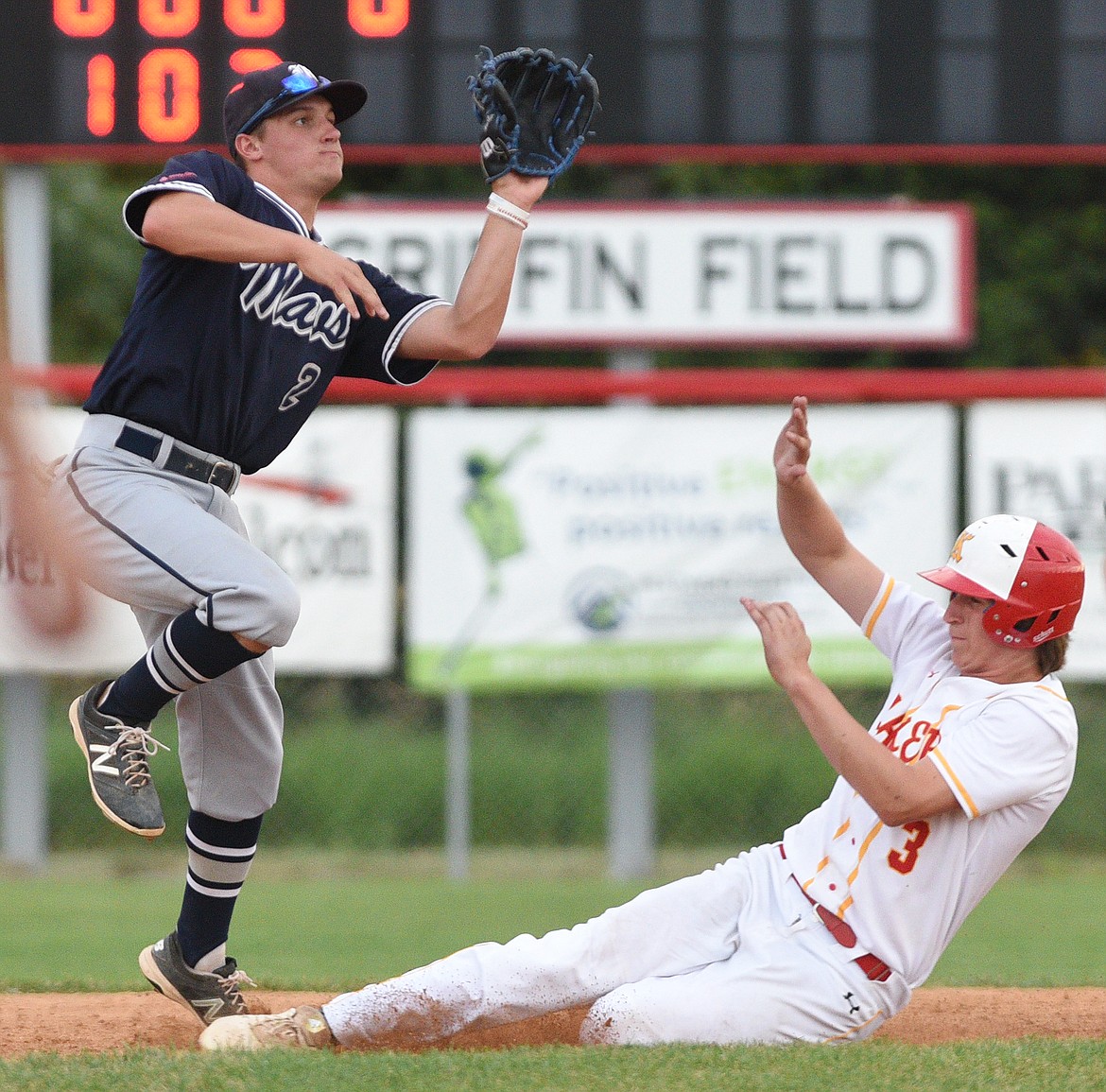 Kalispell Lakers AA's Eric Seaman slides in to second base ahead of the throw on a delayed steal in the bottom of the fourth against the Missoula Mavericks at Griffin Field on Tuesday. (Casey Kreider/Daily Inter Lake)