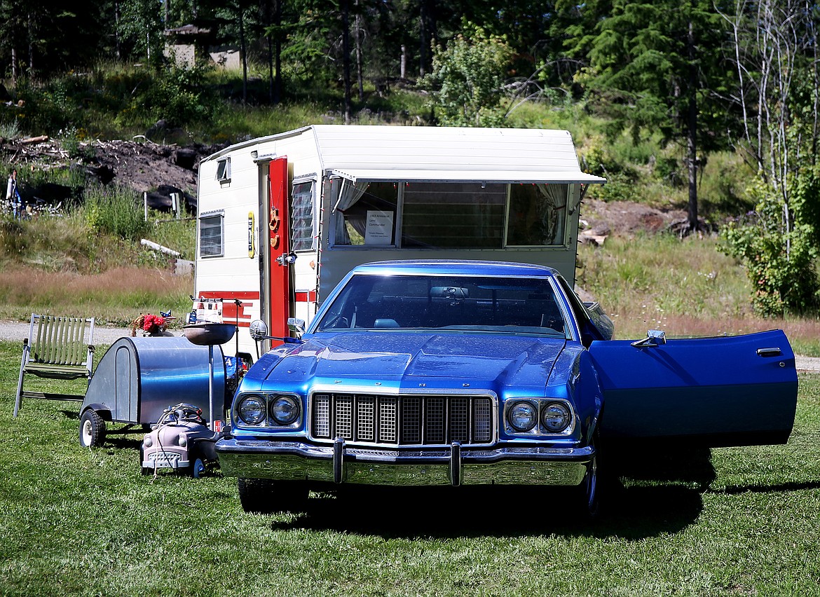 Pete Shinn and his partner Linda pull their vintage trailers with either their 1949 Studebaker truck or their 1974 Ford Ranchero (shown here). On the left is their &#147;car-b-cue,&#148; an antique kids&#146; car and trailer hitched by a grill. (LOREN BENOIT/Press)