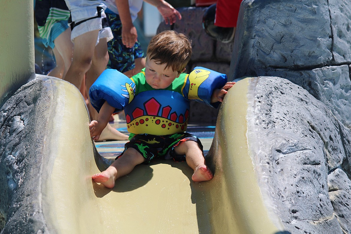 Cheryl Schweizer/Columbia Basin Herald
Sometimes it&#146;s a really, really long way down that slide at the shallow end of the Surf &#145;n Slide water park. The pool becomes a very attractive place when temperatures get close to 100 degrees.