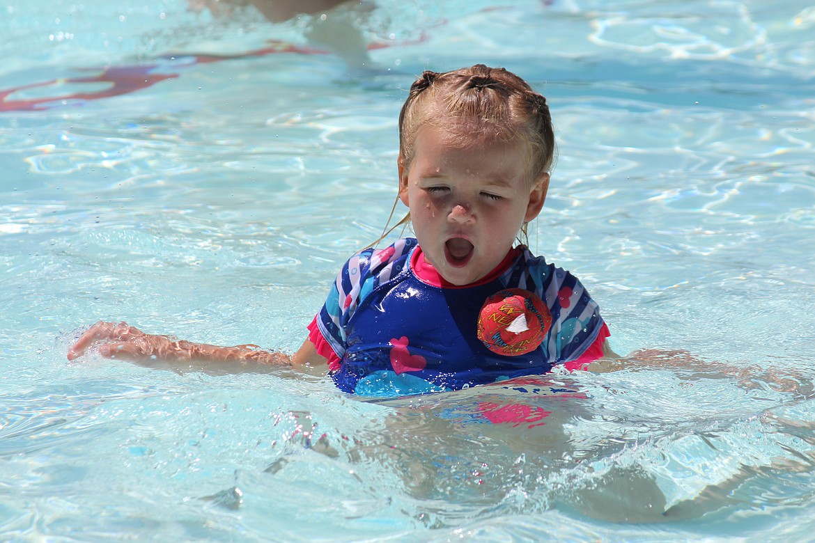 Cheryl Schweizer/Columbia Basin Herald
Splashing in the pool, the Surf &#145;n Slide water park in this case, is the perfect remedy for very hot weather.