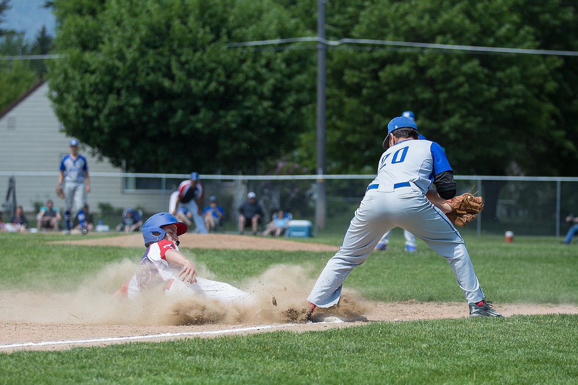 (Photo by BILL ANTHONY PHOTOGRAPHY)
Conrad Becker, who plays for the Lakers Junior Single A team, slides into third.