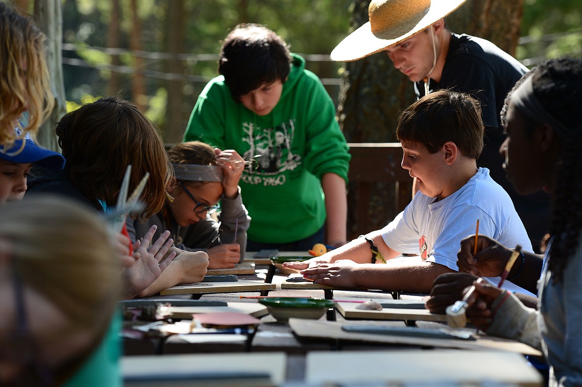 Campers work on pottery projects at Flathead Lutheran Bible Camp in Lakeside on Wednesday, July 11. (Casey Kreider/Daily Inter Lake)