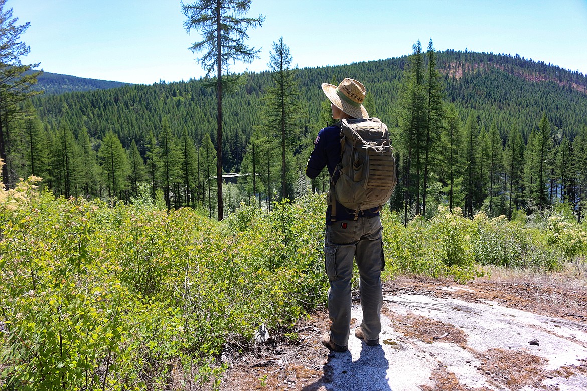 Photo by MANDI BATEMAN
Using a high vantage point to look for clues.