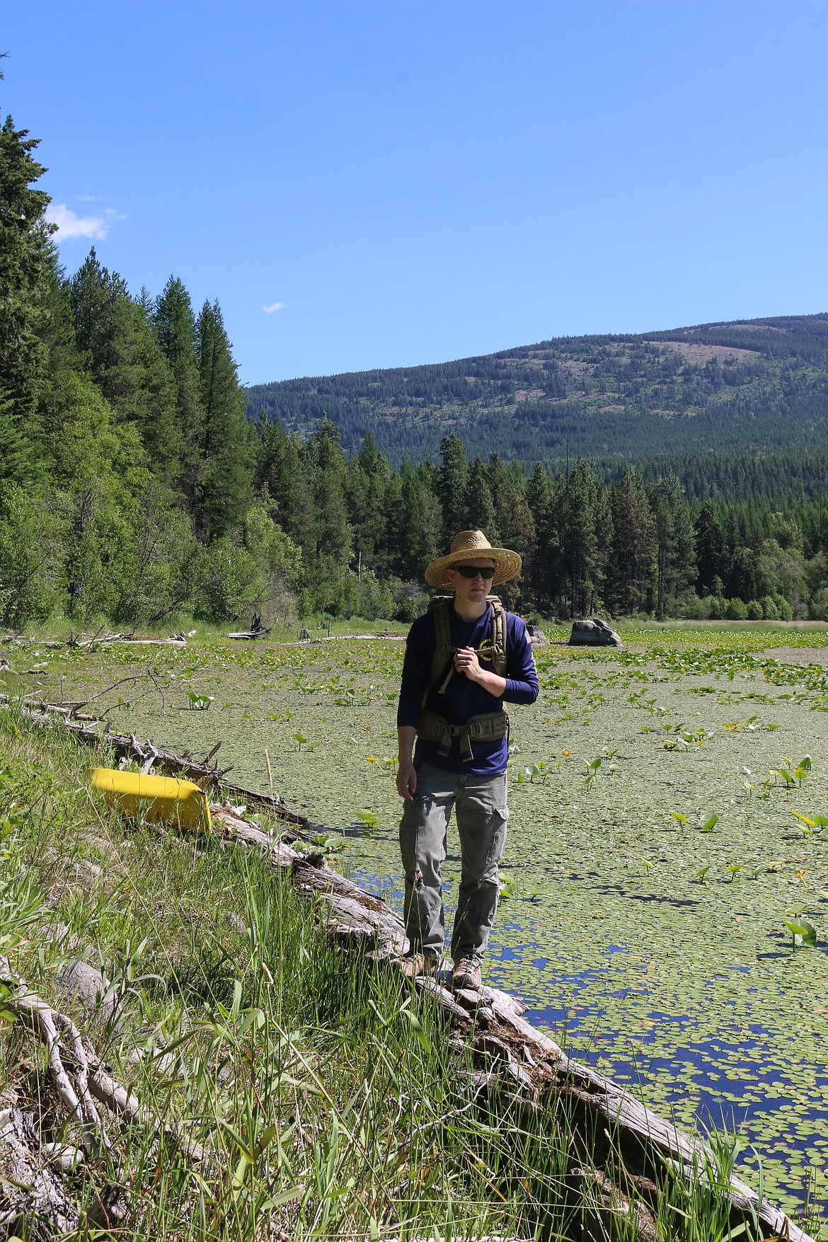 Photo by MANDI BATEMAN
Search and Dive Rescue volunteer Evan Phillips with the missing fisherman's kayak during the mock search.