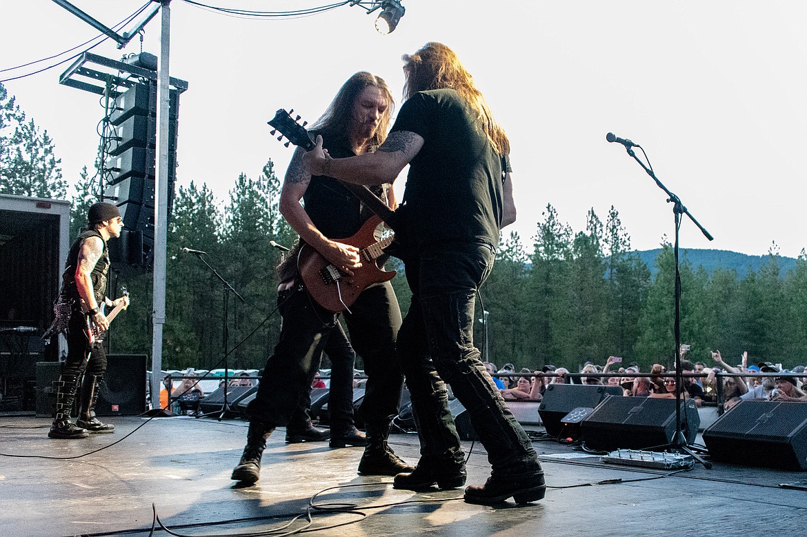 Skid Row guitarists Scotti Hill and Dave &#147;Snake&#148; Sabo jam in the foreground with bassist Rachel Bolan and frontman ZP Theart (hidden) in the background as the band plays &#147;Piece of Me&#148; during the CARD Foundation&#146;s Big Sky Bash Saturday night in J. Niels Memorial Park.