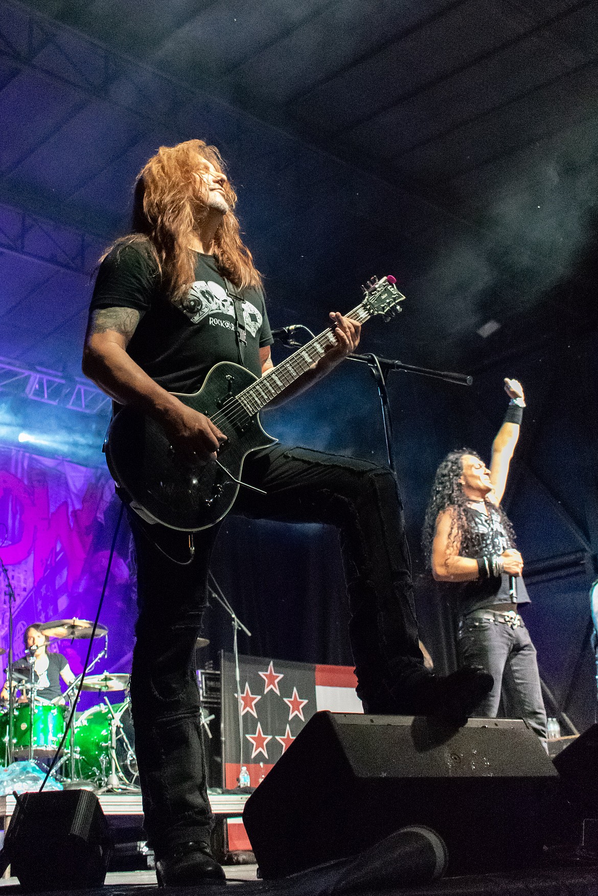 With guitarist David &#147;The Snake&#148; Sabo in the foreground, Skid Row frontman ZP Theart salutes and thanks the audience near the end of their show during the Big Sky Bash to benefit the Card Foundation on Saturday. (Ben Kibbey/The Western News)