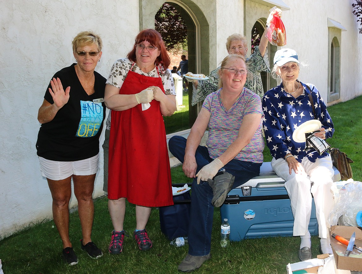 Photo by MANDI BATEMAN
Liz Bigsby, Tina Brewer, Sue Williams, Ann George and Jan Jarrott (in the back) brought food and fun to the community on July 12 at the Community Action Partnership&#146;s appreciation day event.