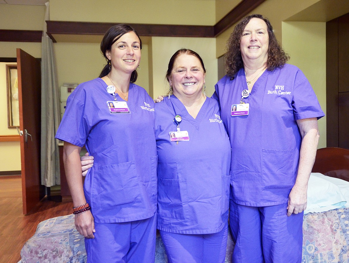 Registered nurses Sandra Beale, Birth Center Director Cindy Walp, Debbi Foss inside one of the suites at the Birth Center at North Valley Hospital.  (Heidi Desch/Whitefish Pilot)