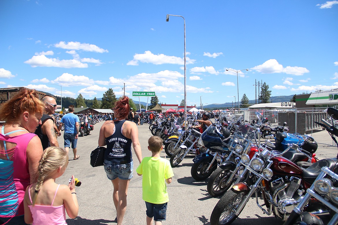 (Photo by MARY MALONE)
Families check out the motorcycles during Run Whatcha Brung in Oldtown on Saturday.