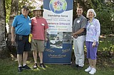 Sparrow's Nest receives donation from visiting Long Islanders