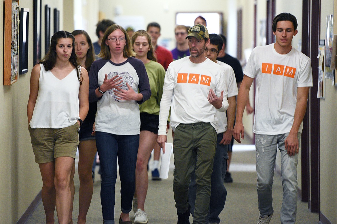 Director Michael Polish talks to students as they head outside for class at The Montana Academy of the Arts at Flathead Valley Community College on Wednesday. (Casey Kreider/Daily Inter Lake)