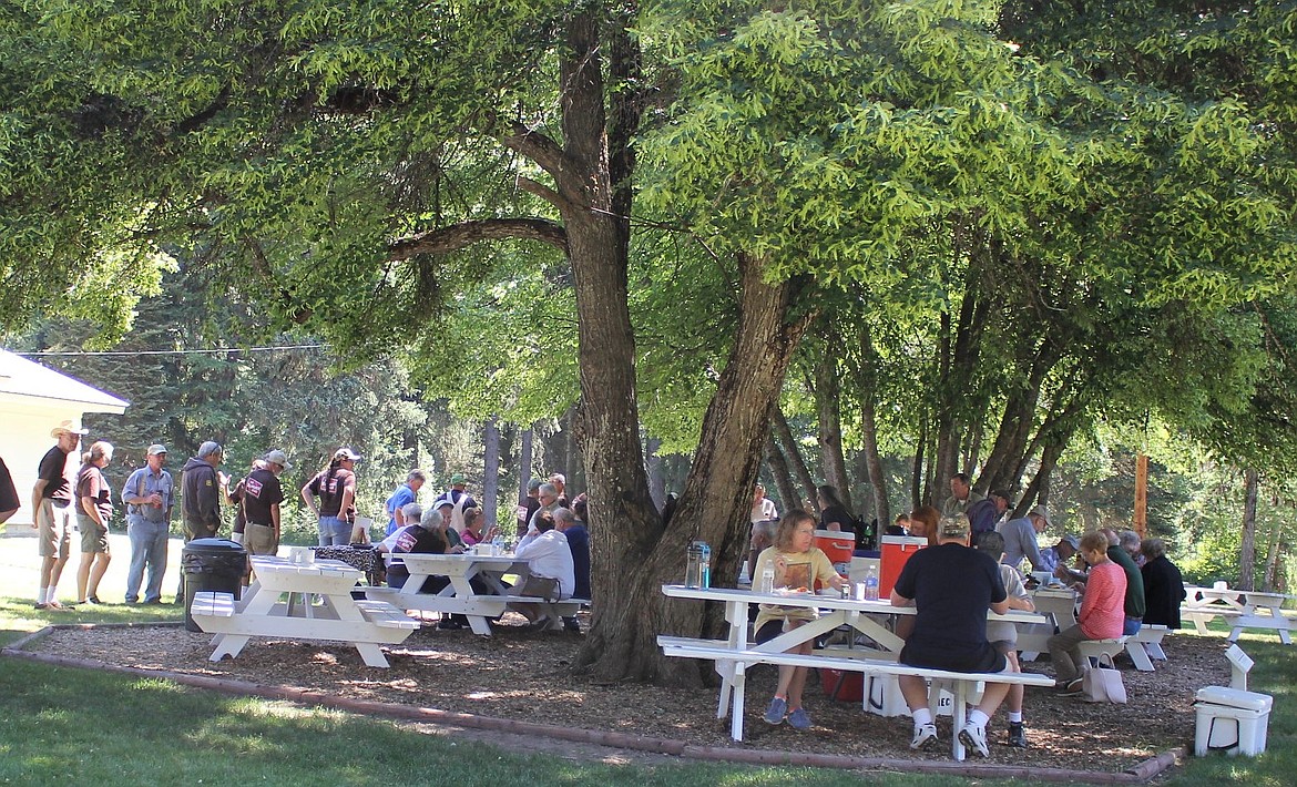 Passport in Time (PIT) volunteers enjoy a picnic as part of their annual reunion at Savenac Historic Tree Nursery on July 13. (Photo by Kathleen Woodford/Mineral Independent)