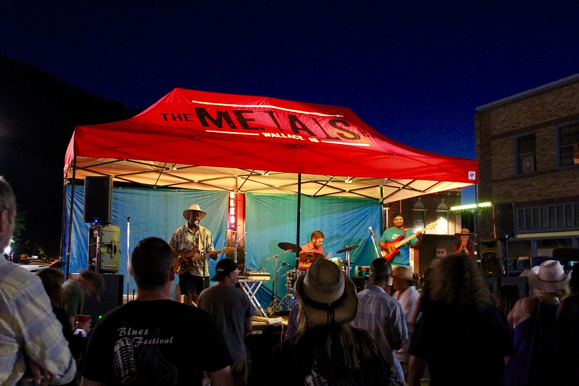 Photo by CHANSE WATSON
Gary Winston (left) &amp; The Real Deal play for blues music lovers on the Cedar Street Stage Saturday night.