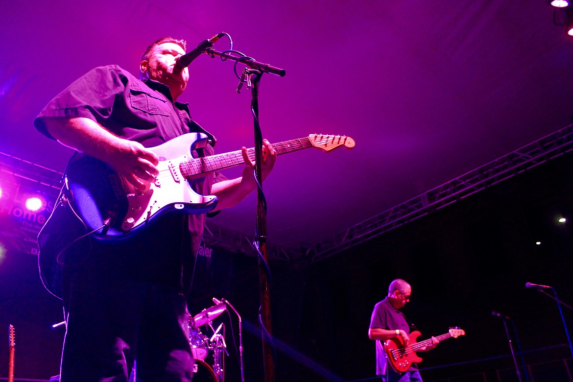 Eubanks (left), bass guitarist Kenny Lawson (right) and drummer Michael Hays (not pictured) jam away during the closing act Saturday night. Eubanks is a favorite of the Blues Fest crowd, as he has preformed at this event for the last six years.