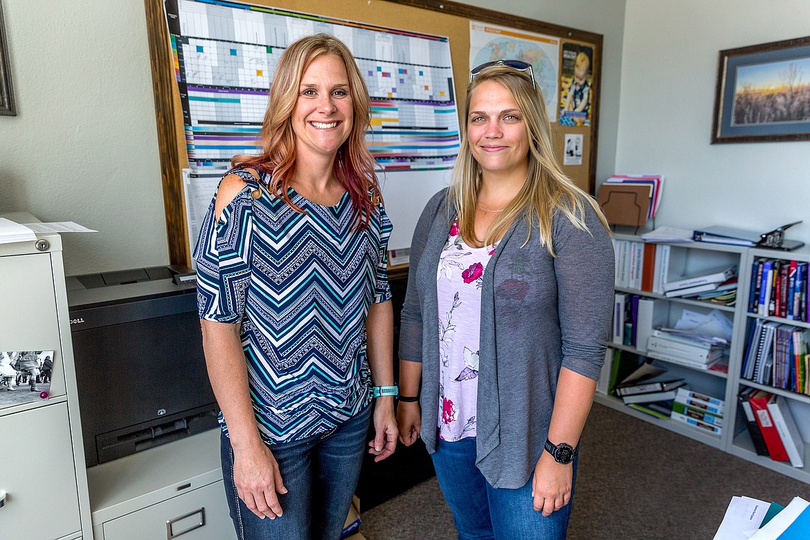 Amy Fantozzi, left, manager of Lincoln County’s behavioral health network, and Jennifer McCully, the county’s public health manager, stand in McCully’s office in Libby Wednesday, July 11. The two have been key in helping the county respond to the closing of Western Montana Mental Health Center’s Libby office at the start of 2018. Their efforts have included leading a coalition of local mental health care and related service providers. (John Blodgett/The Western News)