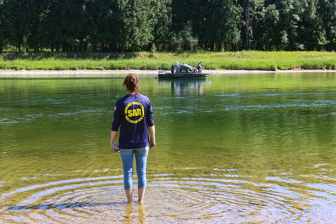 Photo by MANDI BATEMAN
Boundary County Sheriff&#146;s boat searches the Kootenai River for the missing person on Sunday.