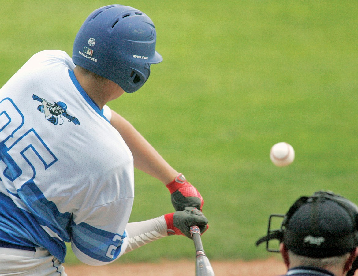 Designated hitter Ayden Williamson&#146;s sacrifice fly scores one in the bottom of first inning vs. the Glacier Twins Wednesday. The Loggers lost 13-4. (Paul Sievers/The Western News)