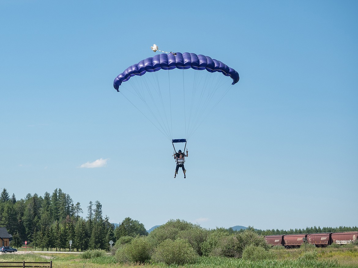 Deanna Freiberg comes in for a landing at Whitefish Airport after jumping out of a plane at 10,000 feet. //Photo provided by Sean Freiberg.