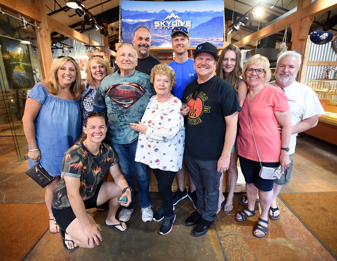 Bob and Deanna Freiberg are surrounded by their friends and family at Skydive Whitefish as they prepare to celebrate their 50th anniversary by jumping out of plane together on July 9, in Whitefish. (Brenda Ahearn/Daily Inter Lake)