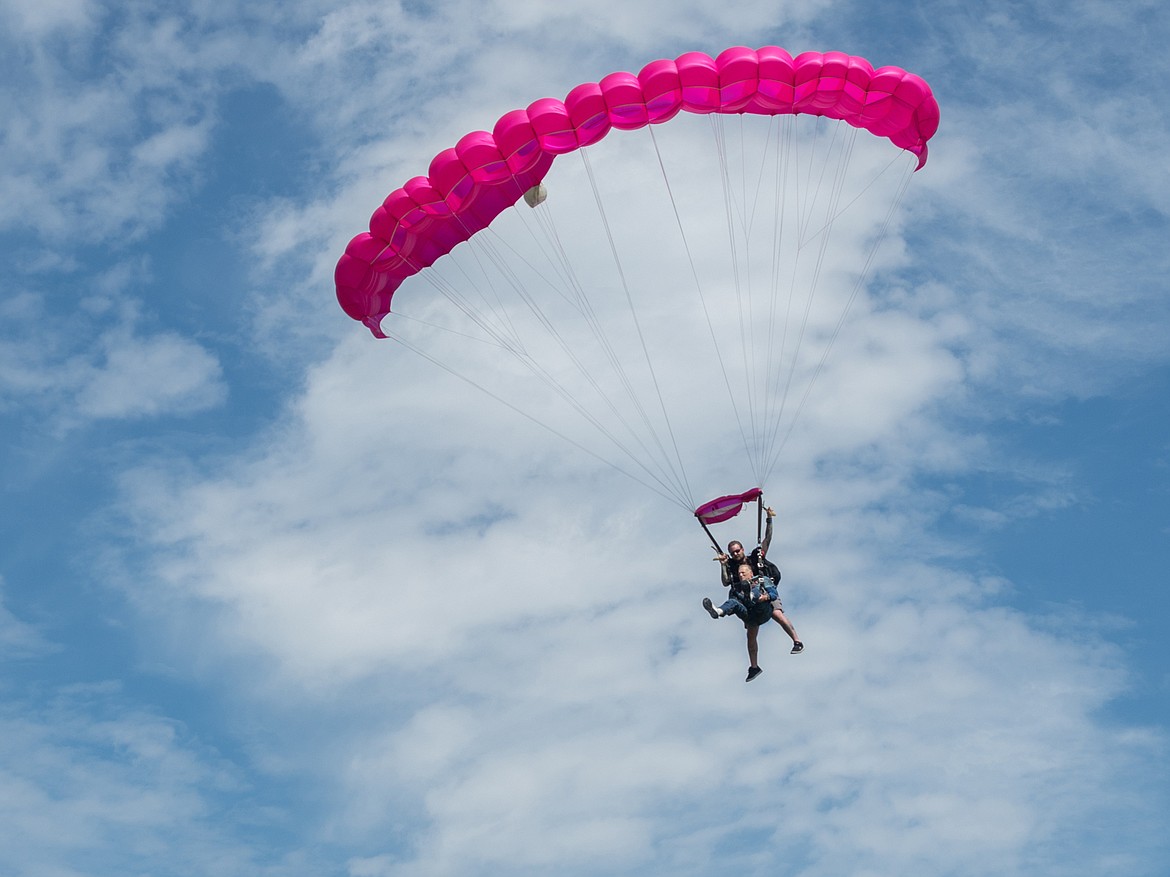 Robert &#147;Bob&#148; Freiberg comes in for a landing behind his wife at Whitefish Airport after skydiving in celebration of their 50th anniversary. //Photo provided by Sean Freiberg