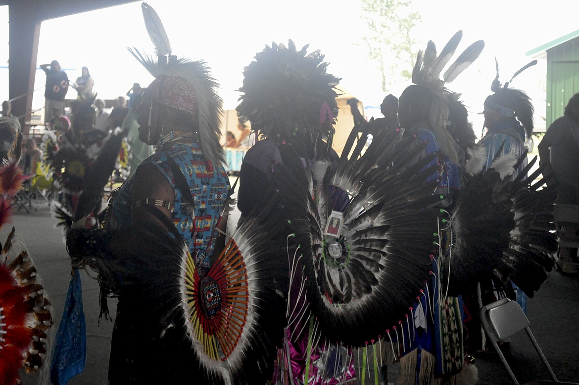 PARTICIPANTS OF THE Arlee Celebration stand moments after the Grand Entry Friday, July 6. (Ashley Fox/Lake County Leader)