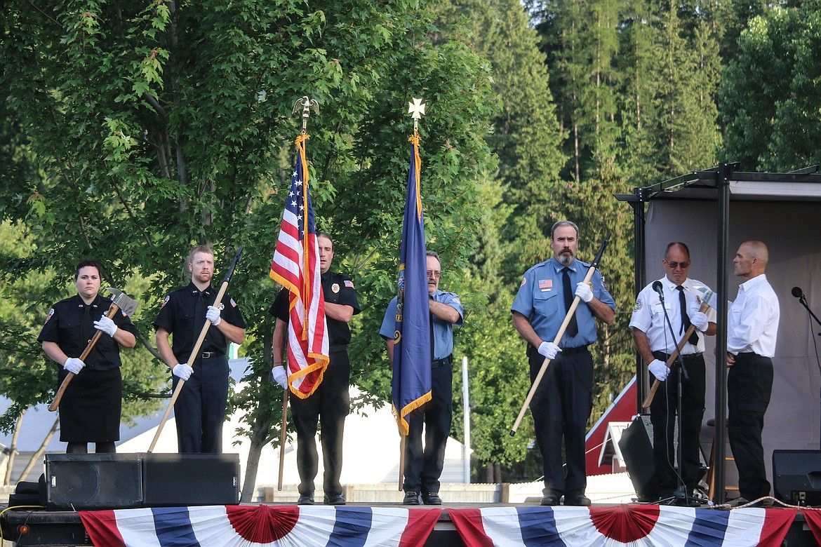 Photo by MANDI BATEMAN
The Boundary County Fire Service Honor Guard
presenting the flag during the opening ceremony.