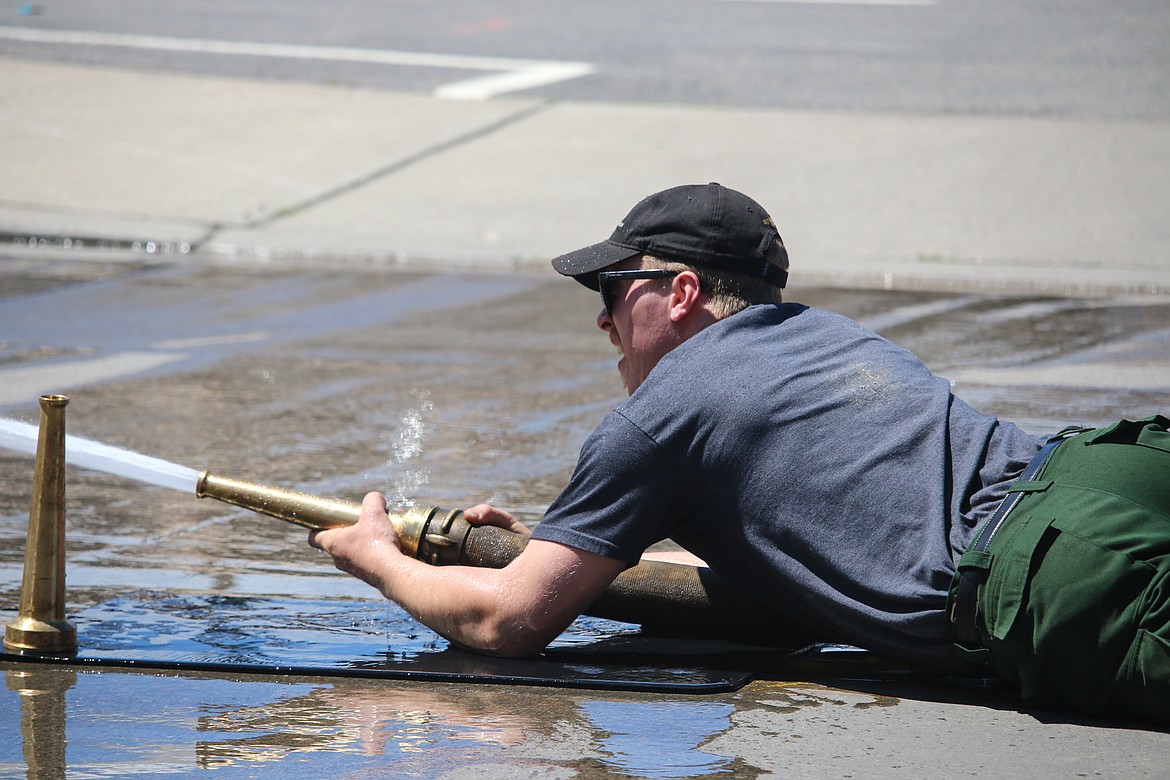 Photo by MANDI BATEMAN
Firefighter during the double evolution round.