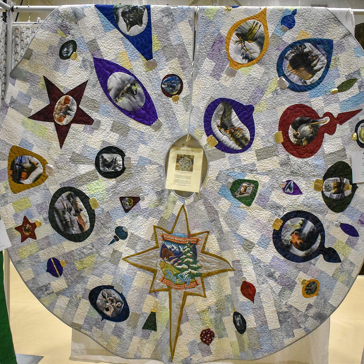Included in the show were pieces such as &#147;Kootenai Treasures,&#148; a tree skirt made by the Wednesday Nite Quilters from Eureka for the 25-foot Christmas tree that went from the Kootenai National Forest to the Secretary of Agriculture&#146;s office in 2017.