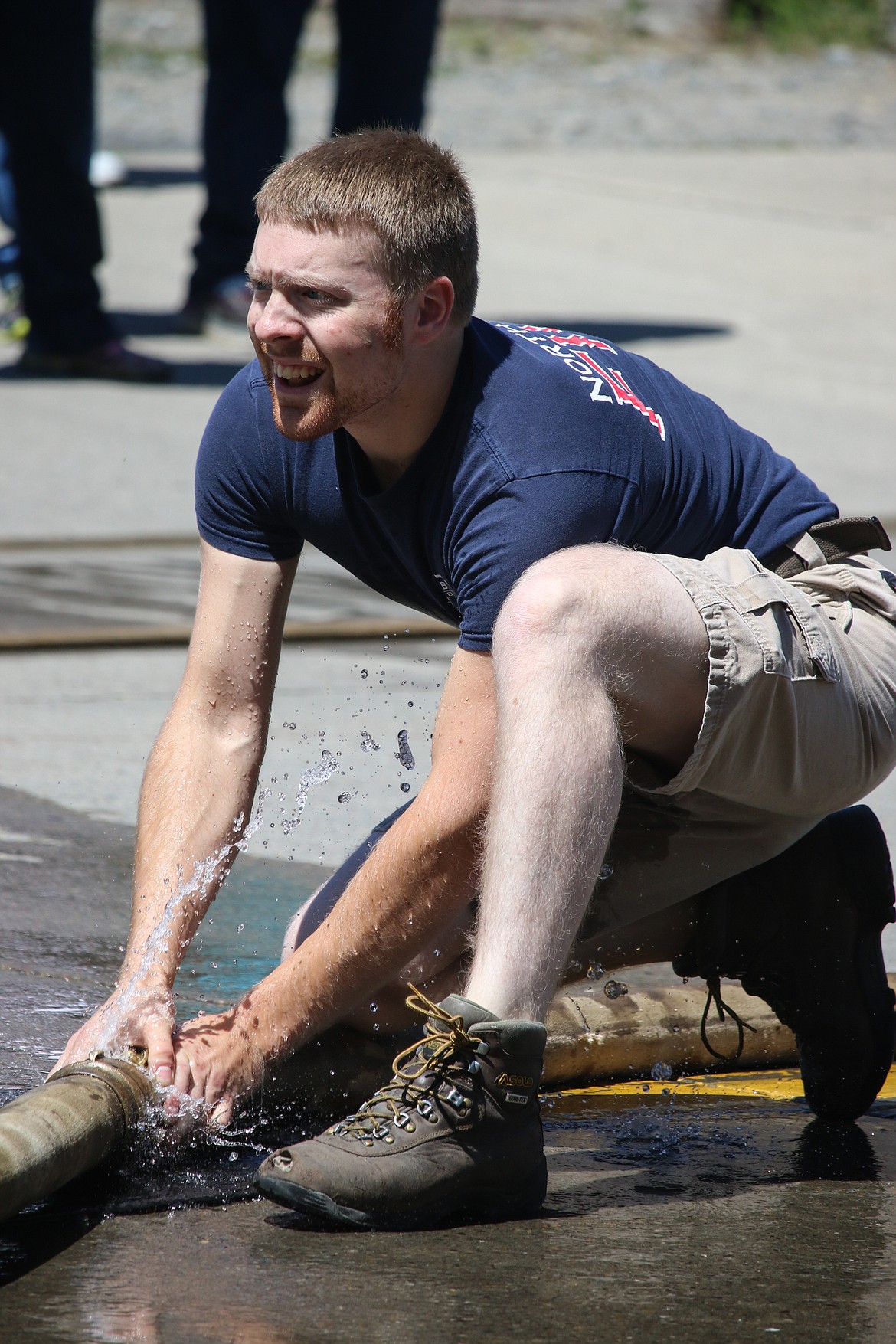 Photo by MANDI BATEMAN
North Bench firefighter Granit Allinger during the hose competition.