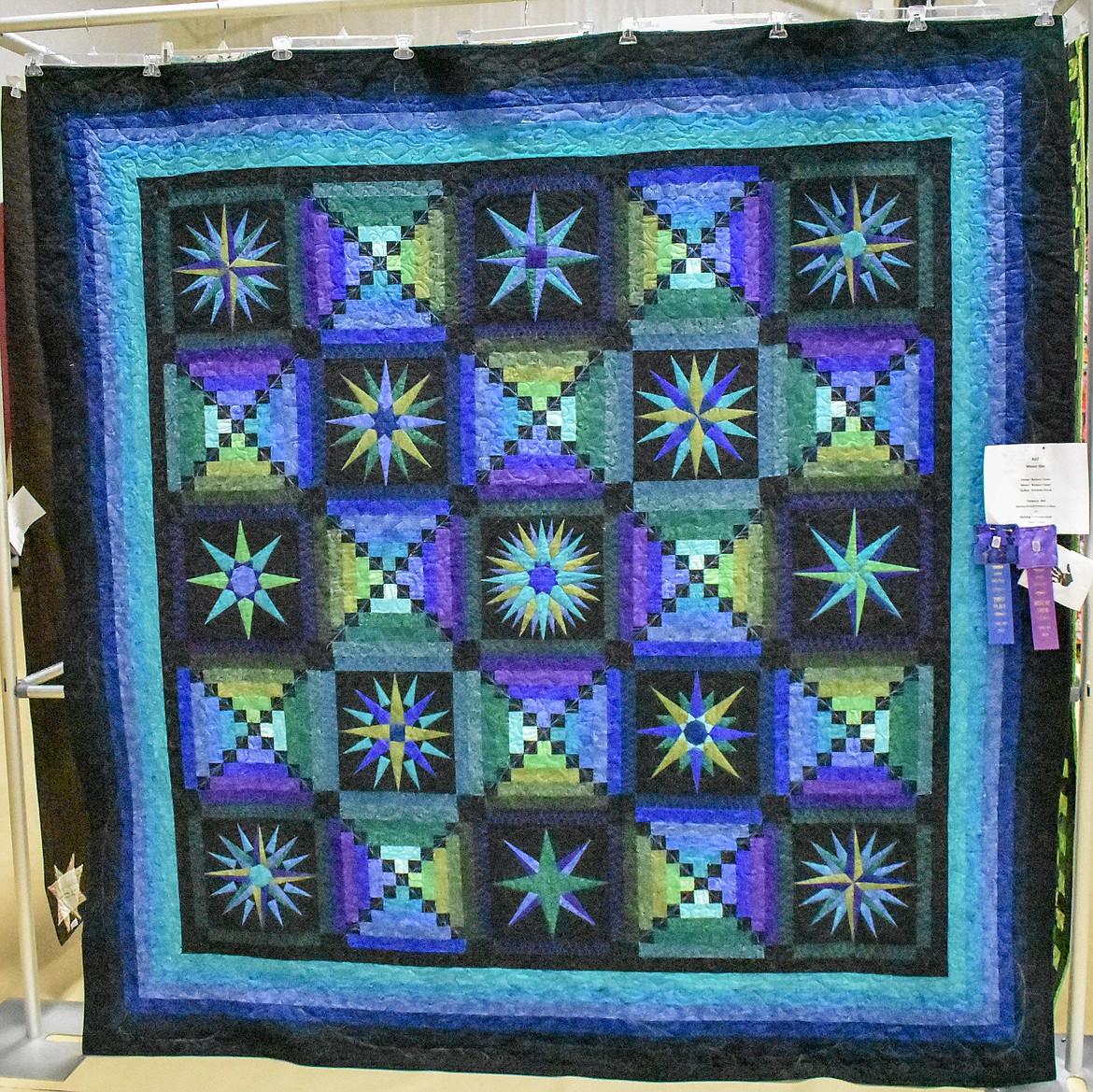 Barbara Taylor was the maker and Kathleen Pierce the quilter for &#147;Moon Glo.&#148;
