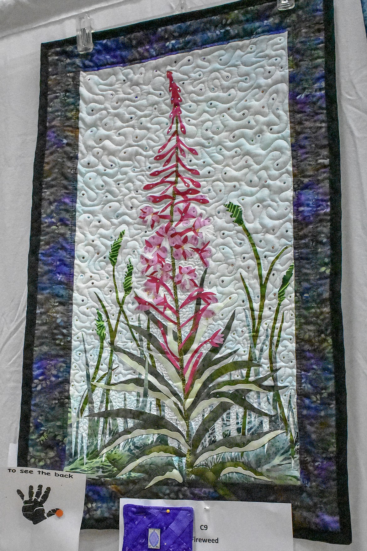 Kathleen Pierce won second place in the &#147;wall&#148; category for her &#147;Fireweed&#148; piece.